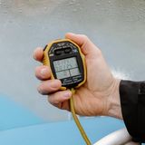 Spitzensport Hand mit Stoppuhr