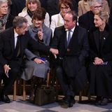 Nur noch symbolisch in der ersten Reihe: Frankreichs Ex-Staatschefs Nicolas Sarkozy (l.) und sein Vorgänger François Hollande mit ihren Ehefrauen Carla Bruni und Julie Gayet