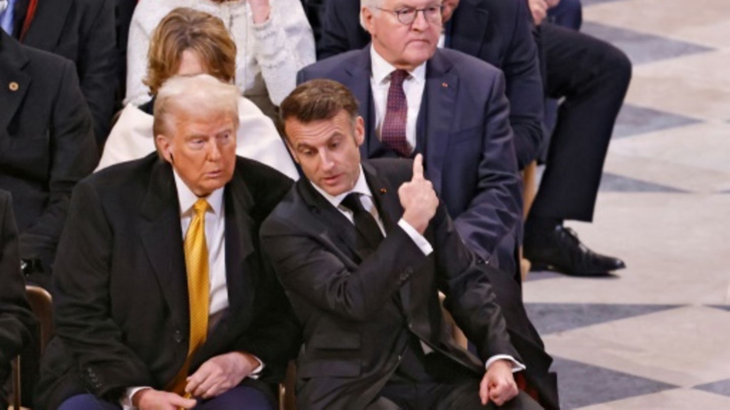 Designierter US-Präsident Trump am Samstag in Paris mit Frankreichs Präsident Macron (Mitte) und Bundespräsident Steinmeier (rec