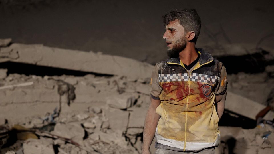 A member of the White Helmets relief organization after a Russian missile hit Idlib in October