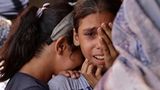 Ein junges Mädchen in Gaza weint