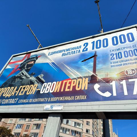 The banner in St. Petersburg advertises Putin