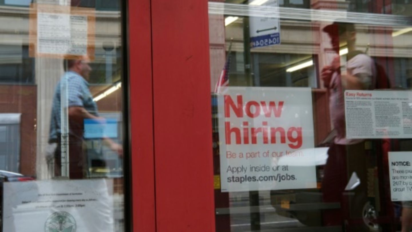 US hiring surged past expectations in December while unemployment dipped, according to government figures
