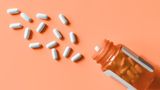 Tabletten und Pillendose