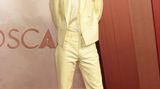 Timothée Chalamet in einem hellgelbem Anzug bei den Oscars
