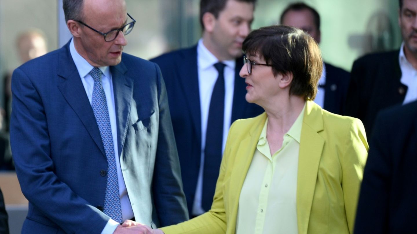 Esken (r.) und CDU-Chef Merz am Samstag