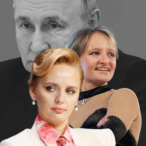 Vladimir Putin in the background, at the front you can see his two daughters