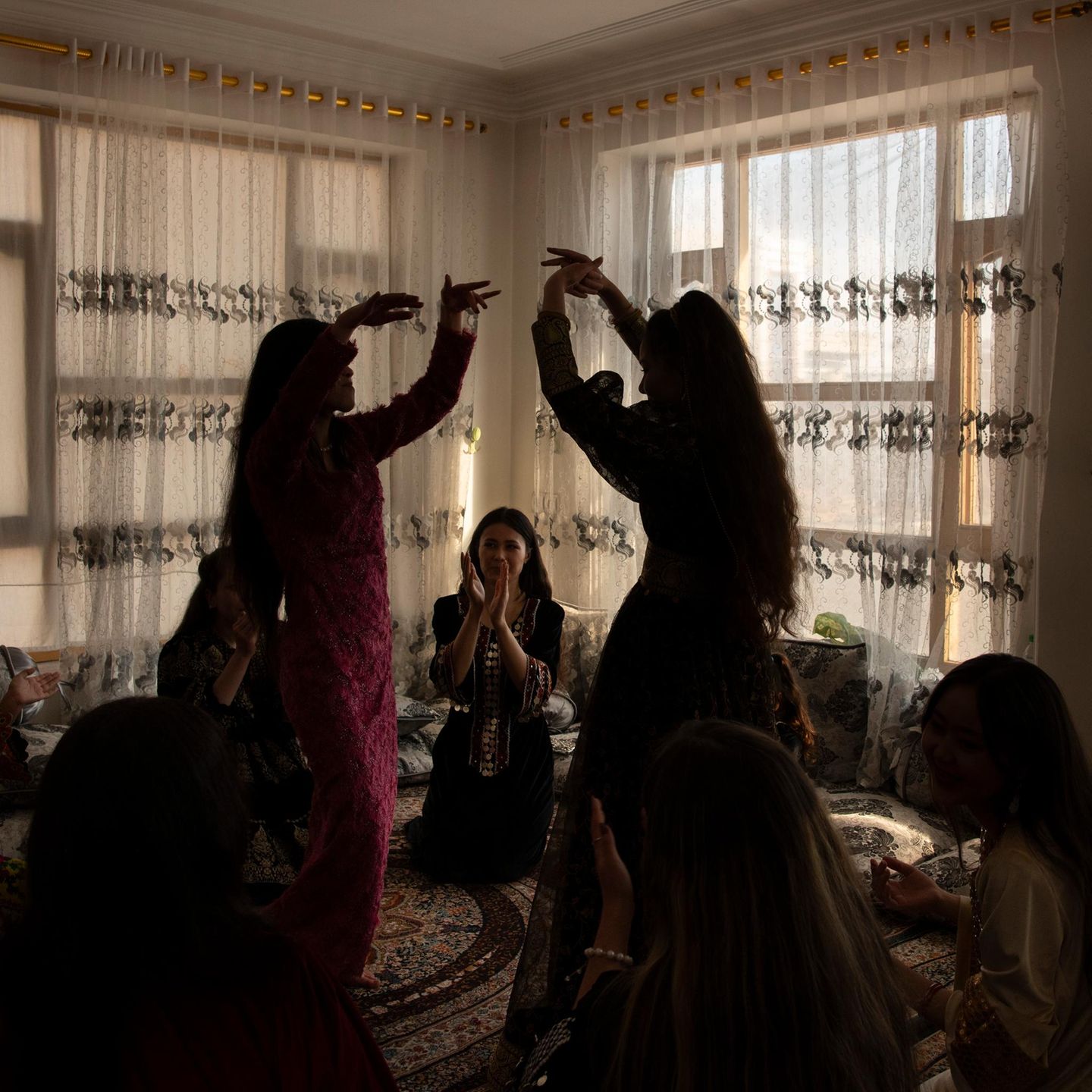 Young women celebrate a friend's birthday
