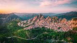 Aerial view of Pietrapertosa rural village in Apennines Dolomiti Lucane. Basilicata, Italy, at sunset