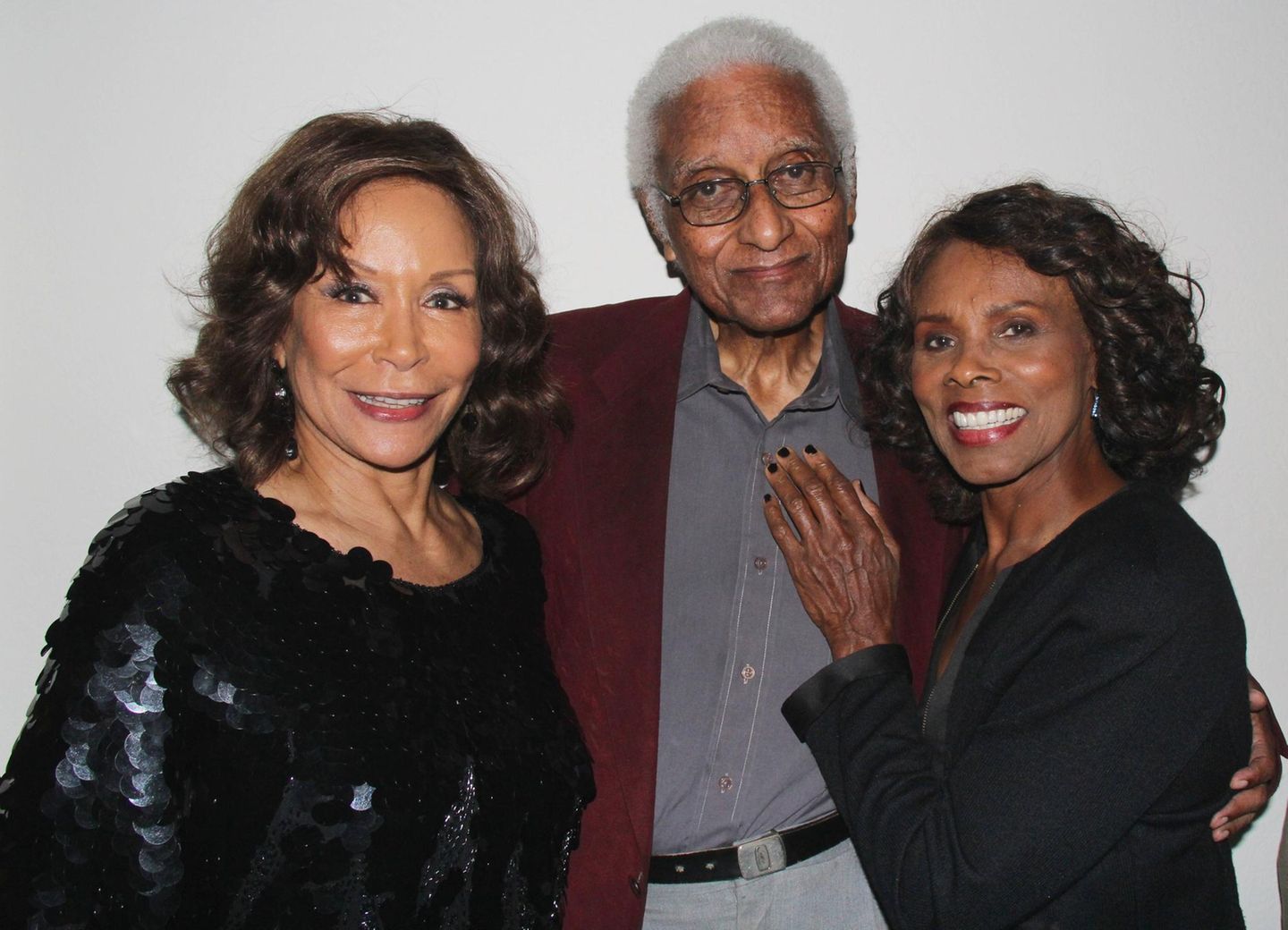 James Bond: Gloria Hendry mit ihrem Ehemann, Jazz-Legende Phil Wright und der Sängerin Freda Payne auf einer Party 2014