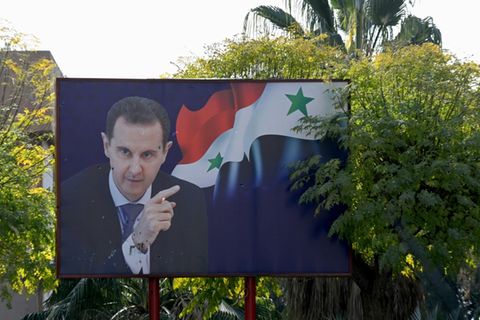 Assad-Poster neben dem Barseh-Forschungszentrum in Damaskus
