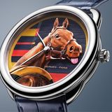 Zifferblatt von Hermès-Uhr, auf dem ein Pferd die Zunge rausstreckt