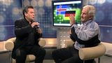 Waldemar Hartmann und Rudi Völler sitzen sich im ARD-Studio gegenüber, Völler schimpft auf Hartmann ein