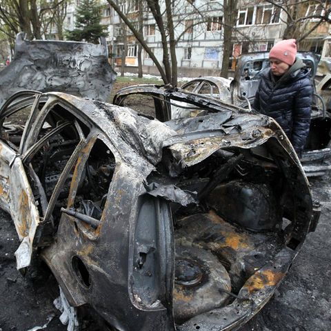 A destroyed car after a Russian drone attack in Dnipro