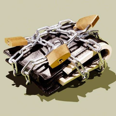 Save certainly in chaotic times: wallet wrapped with chains and locks