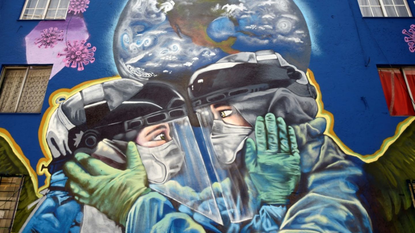Graffiti über die Corona-Pandemie in Mexiko-Stadt