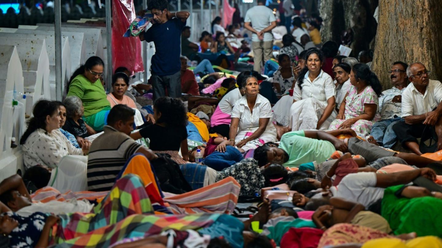 Pilger in der Stadt Kandy