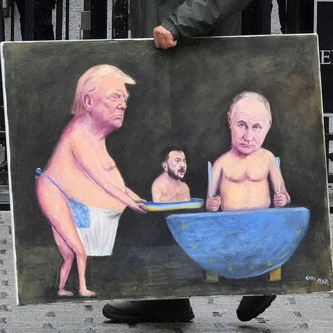 Ukraine negotiations in London and protester before 10 downing street