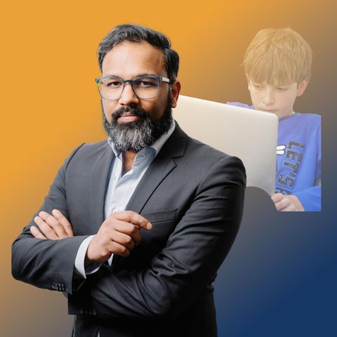 Autor Stephan Anpalagan steht im Anzug da, im Hintergrund ein Kind mit Laptop. Er schreibt über Rechtsextremismus