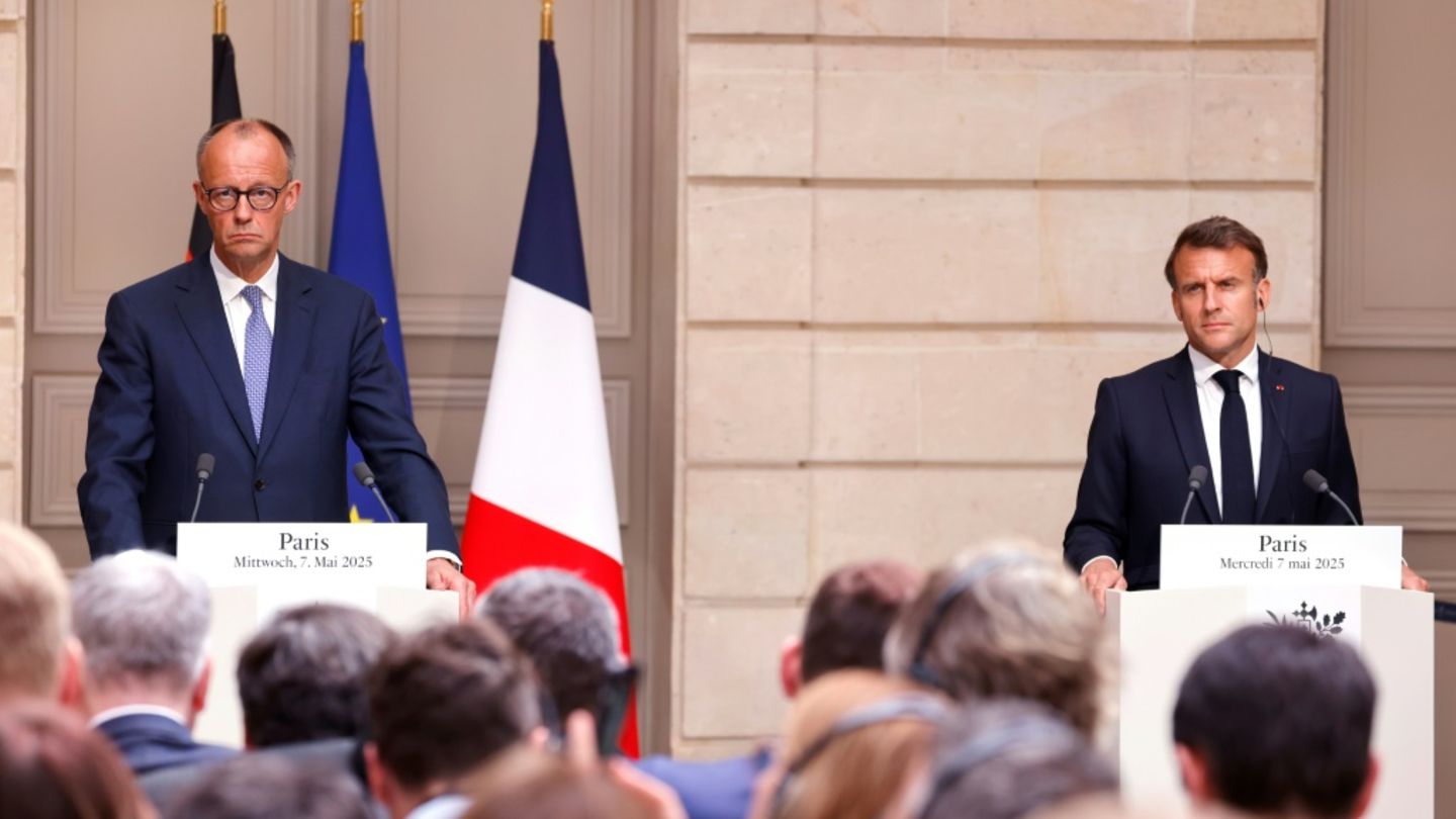 Bundeskanzler Friedrich Merz (l) und Frankreichs Präsident Emmanuel Macron