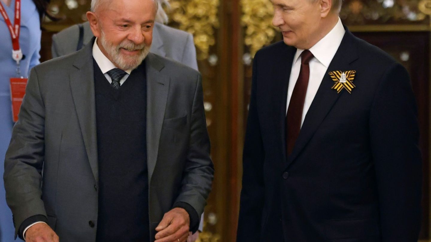 Lula (l.) und Putin in Moskau