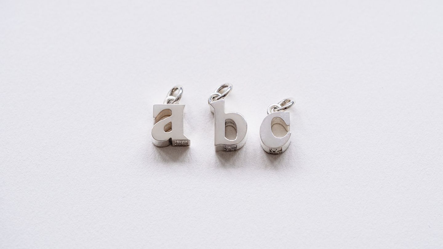 Buchstaben-Anhänger Buchstaben-Anhänger