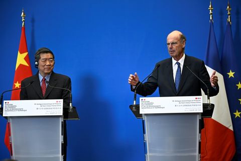 He Lifeng und Eric Lombard
