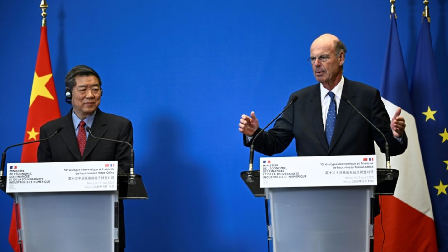 He Lifeng und Eric Lombard