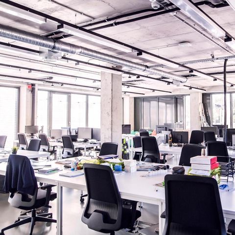Modern designed office with an open room layout, the working time is obviously over: the office is empty
