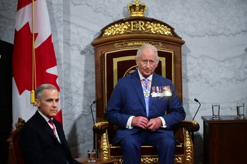 Charles III. (rechts) und Mark Carney