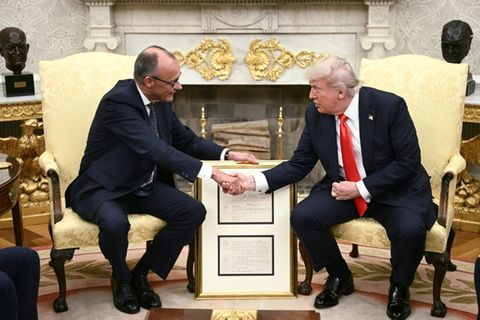 Merz (l.) und Trump