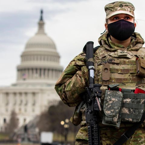 A member of the National Guard in front of the Capitol in Washington DC