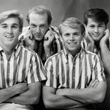 Bandfoto mit Brian Wilson und seinen Bandkollegen in gestreiften Kurzarmhemden