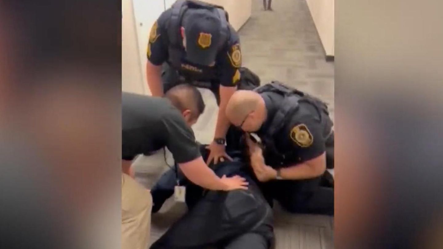 US senator is led away in handcuffs after critical question