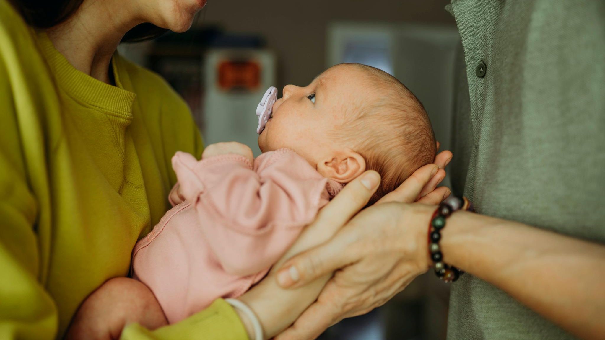 Elterngeld: Eltern mit ihrem Baby Elterngeld: Eltern mit ihrem Baby