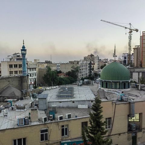 Smoke and smoke rise via Iran's capital Tehran