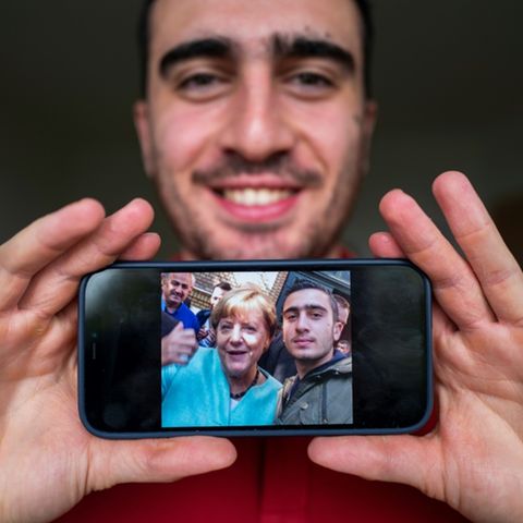 Syrian Anas Modamani with Angela Merkel selfie