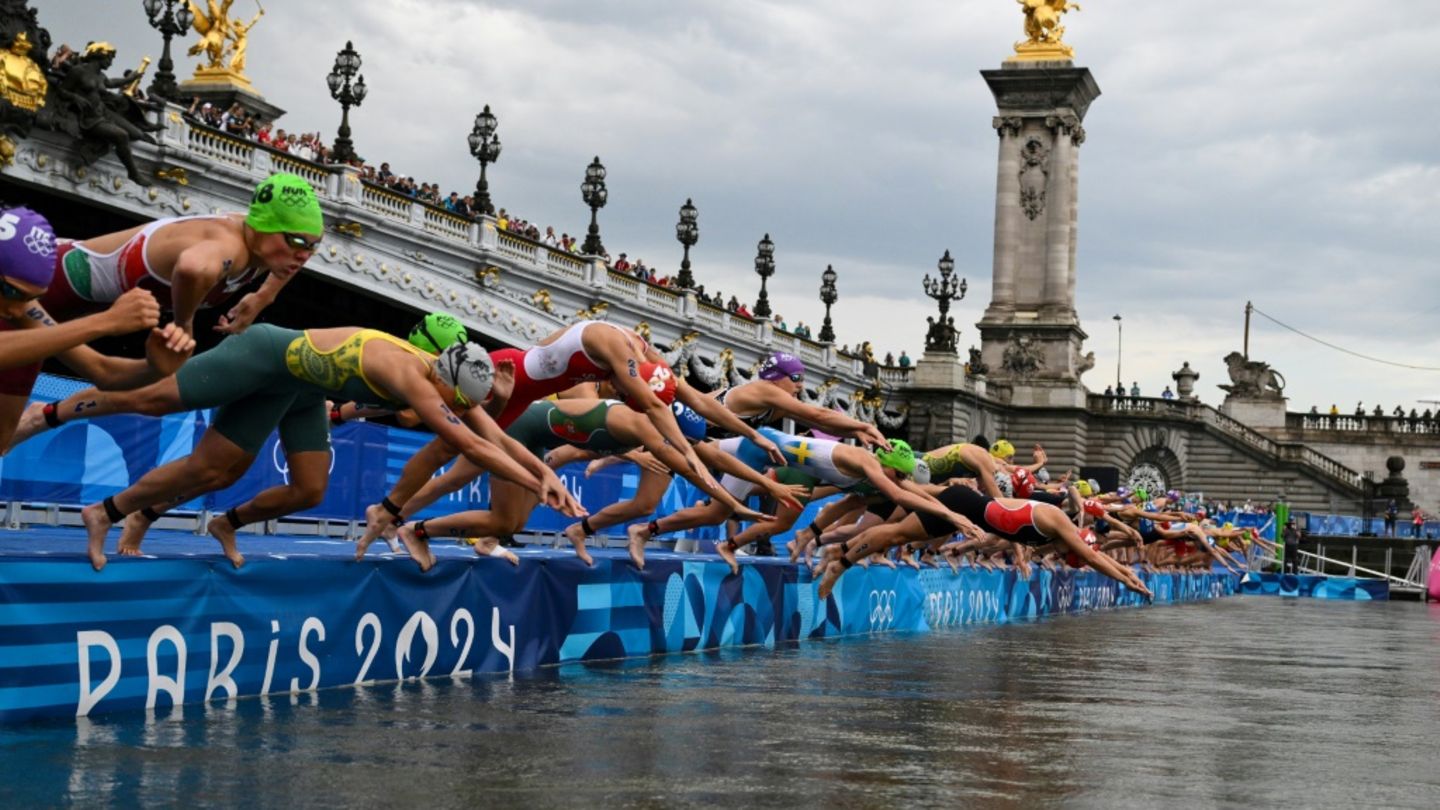 Olympia-Athleten in der Seine