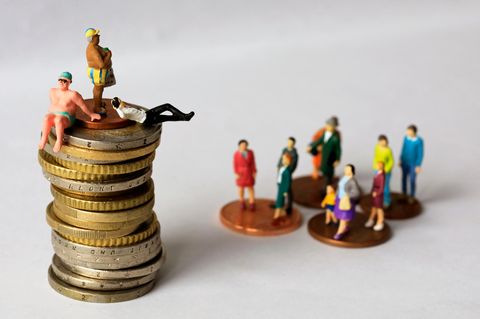 Vermögen: Figuren auf Geldmünzen
