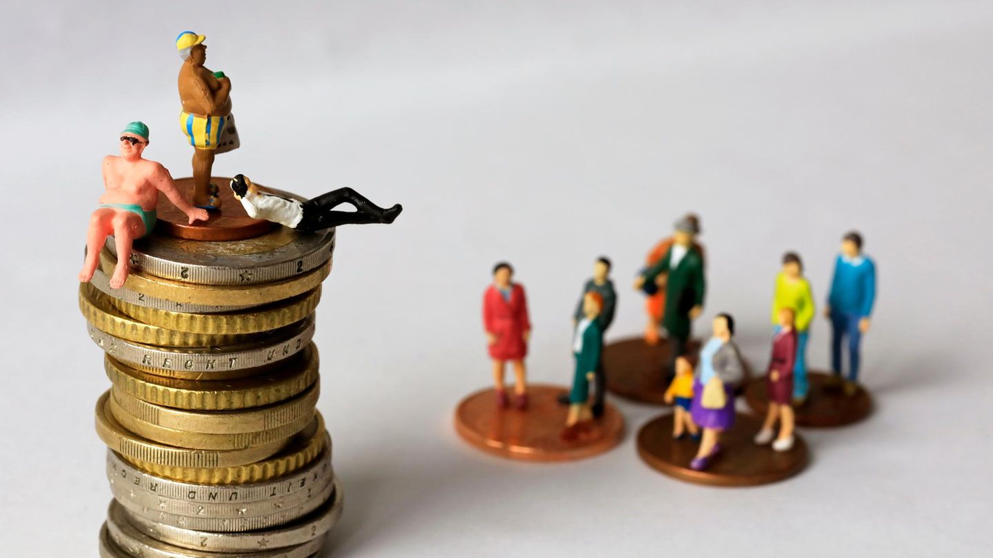 Vermögen: Figuren auf Geldmünzen