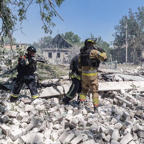Rescue workers are looking for survivors in Kostiannivka in Ukraine in the ruins of a destroyed house