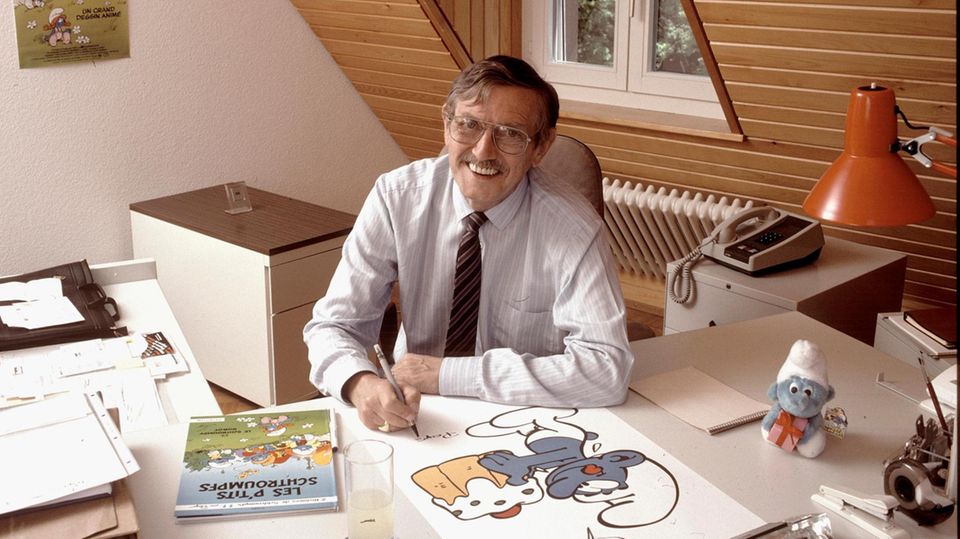 Pierre Culliford alias Peyo, Erfinder der Schlümpfe am Arbeitstisch, 1988