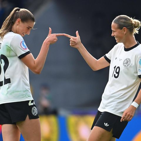 Jule Brand (left) and Klara Bühl celebrate a goal at the women's European Championship