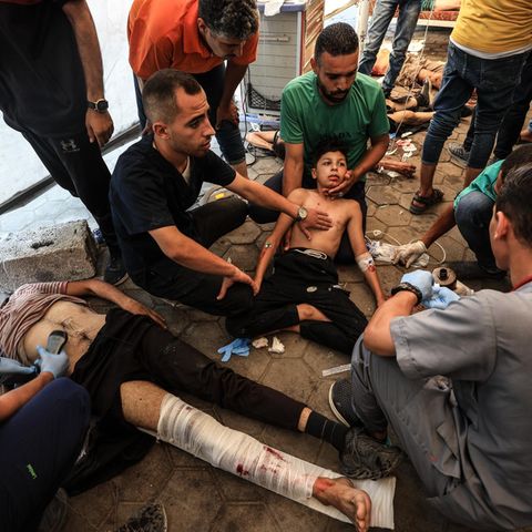 Injured of an Israeli air raid on the ground in the Al-Ali Hospital in Gaza