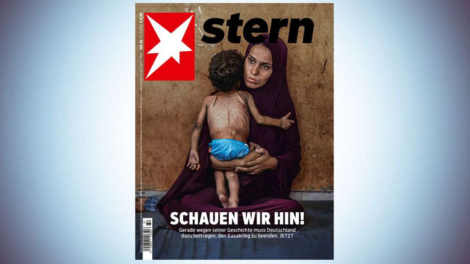 The current star cover shows a mother from Gaza who holds her malnourished child in her arms