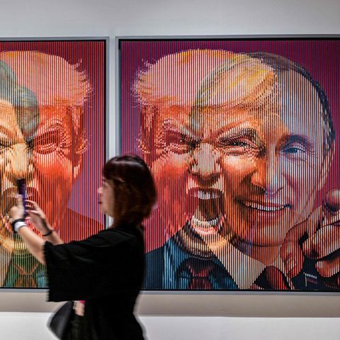 Vladimir Putin (right) and Chinese President Xi Jinping annoy Donald Trump in this art installation in Indonesia