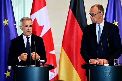 Mark Carney (l.) und Friedrich Merz