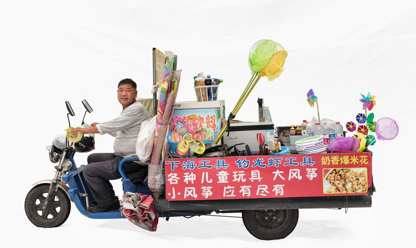 Spielzeugverkäufer Xuxing mit seinem Mobil