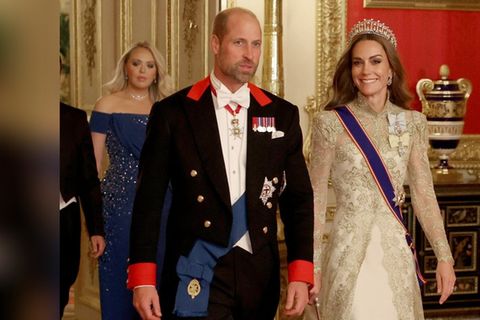 Prinz William und Prinzessin Kate schreiten am Mittwoch zum Staatsbankett auf Schloss Windsor.