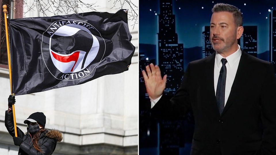 Anhänger der Antifa Bewegung mit einem Banner